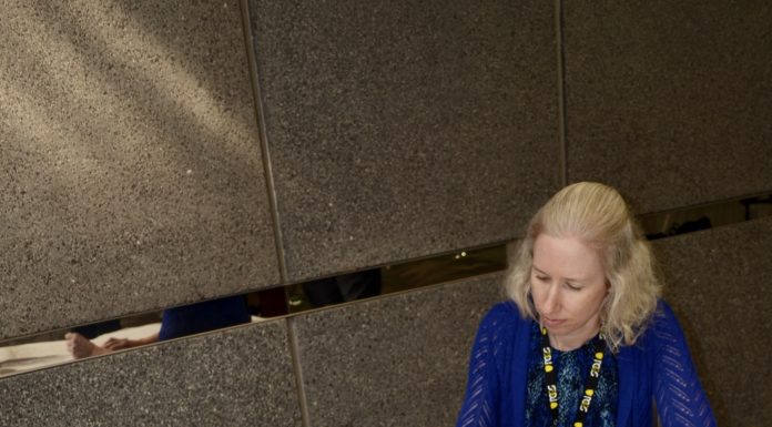 Acclaimed Coin Designer Emily Damstra Signs and Donates Eagles Artwork To ANA Emily Damstra signs artwork.